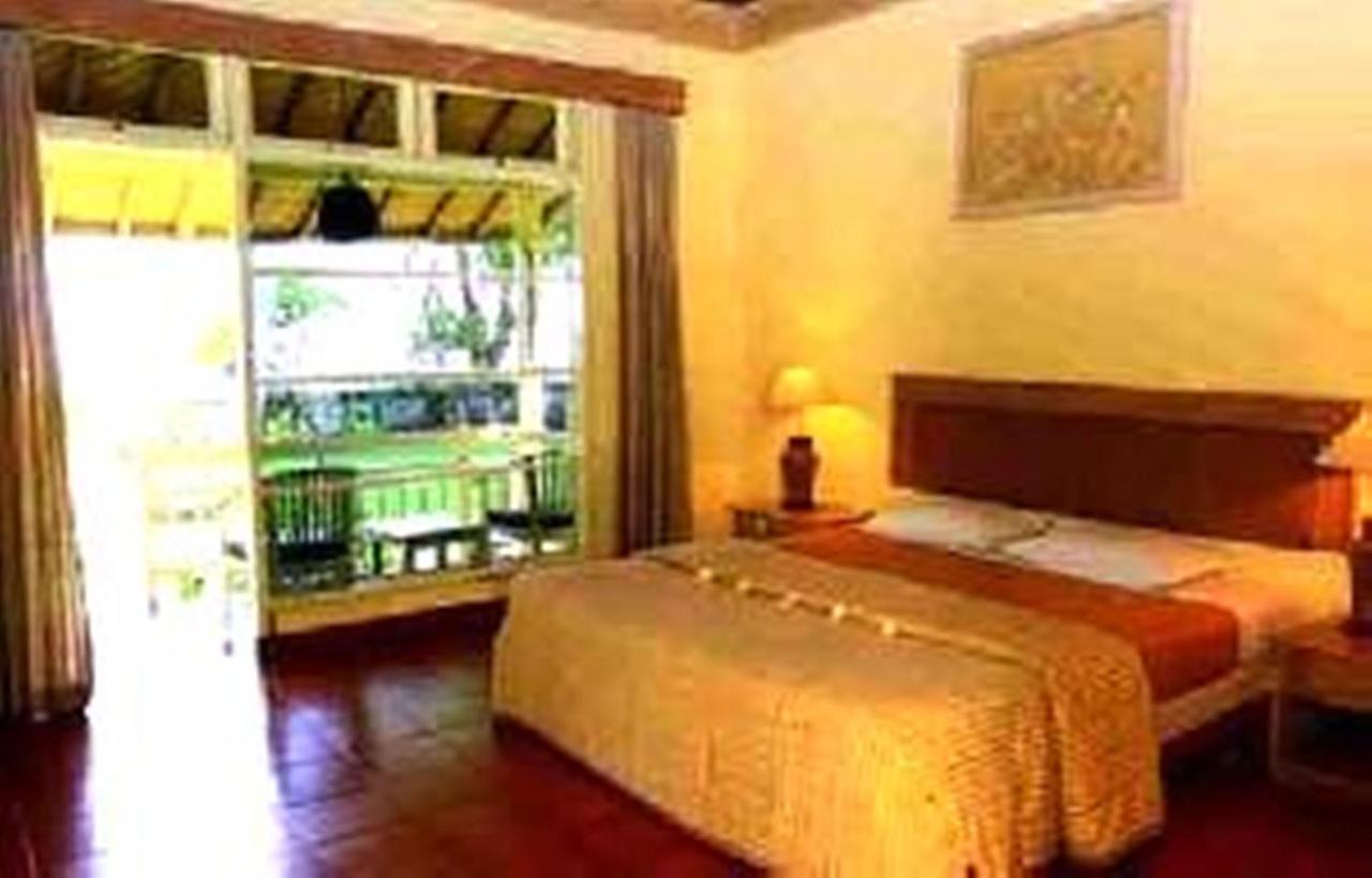 Bali Lovina Beach Cottages Buleleng  Bilik gambar